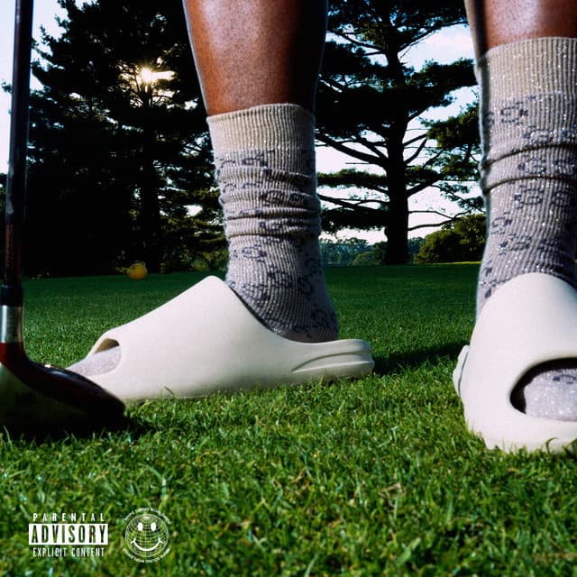 Yeezy Slides, Gucci Socks